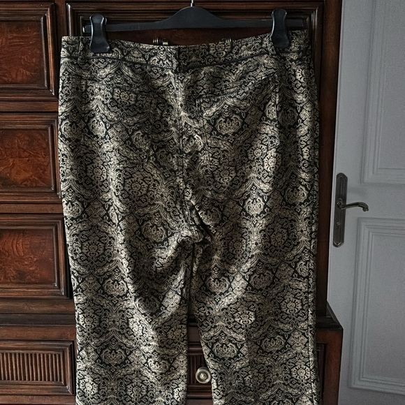 Patterned black and pale yellow pants. - Picture 4 of 5